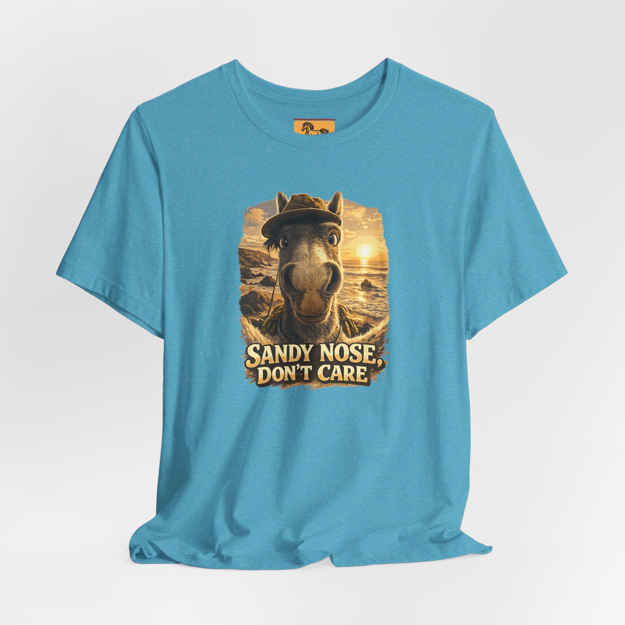 Sandy nose, don't care. A cheeky horse beach selfie tee for horse lovers who live for summer. Super soft Bella + Canvas 3001. Shop now at Hay There Horse Art.