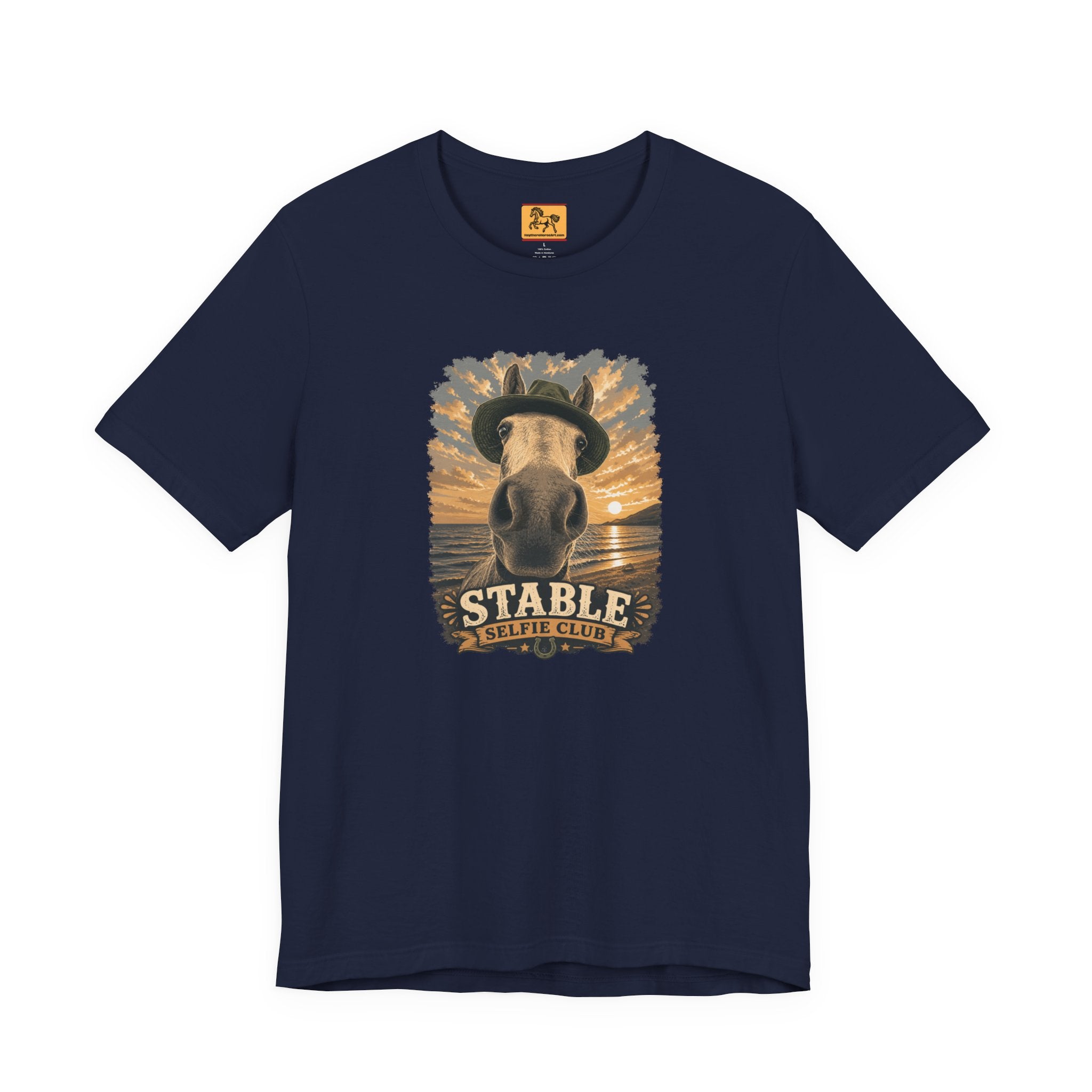 Stable Selfie Club unisex t-shirt in navy, featuring original equestrian artwork of a horse wearing a hat taking a selfie at sunset on a beach, printed on Bella & Canvas 3001 tee by Hay there Horse Art.